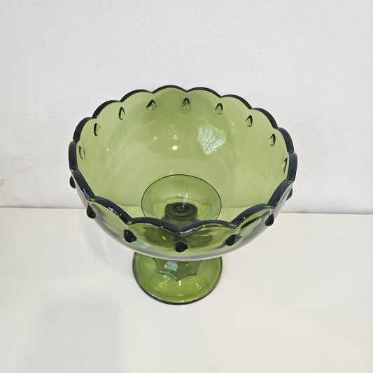 Footed green glass bowl