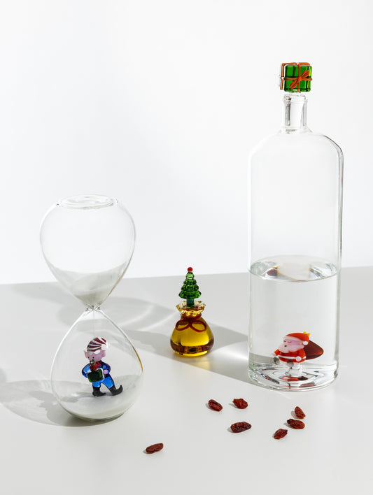 CHRISTMAS TALES - bottle Santa with sack inside green gift lid