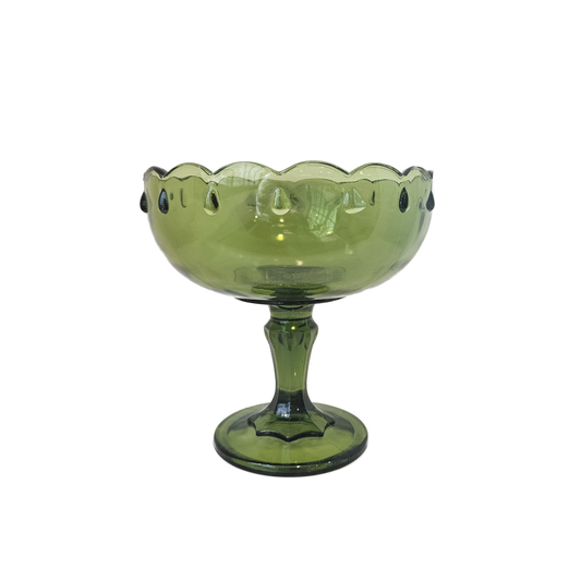 Footed green glass bowl